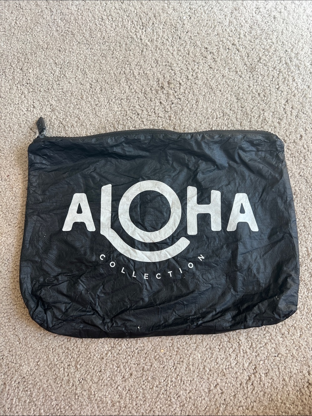 ALOHA Collection Black Zip Pouch with White Logo